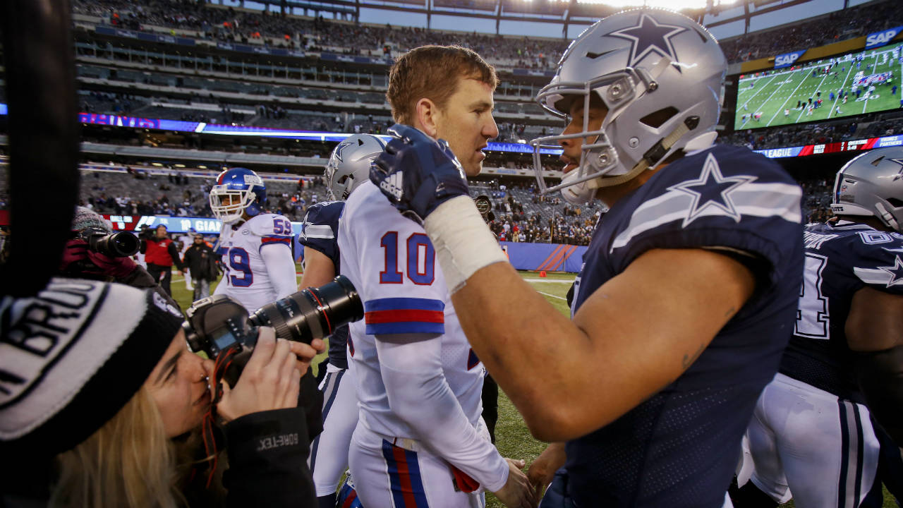 New-York-Giants-quarterback-Eli-Manning-(10)-greets-Dallas-Cowboys-quarterback-Dak-Prescott-(4)-after-an-NFL-football-game,-Sunday,-Dec.-10,-2017,-in-East-Rutherford,-N.J.-The-Cowboys-won-30-10.-(Adam-Hunger/AP)