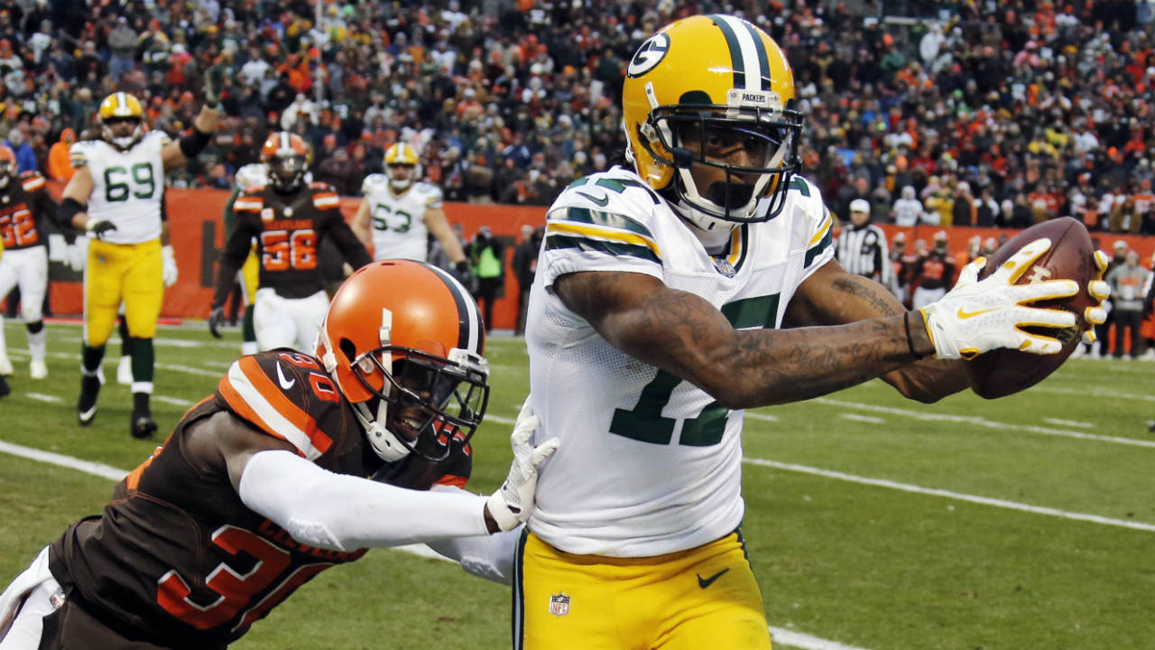Green-Bay-Packers-wide-receiver-Davante-Adams-(17)-catches-a-1-yard-pass-for-a-touchdown-under-pressure-from-Cleveland-Browns-defensive-back-Jason-McCourty-(30)-in-the-second-half-of-an-NFL-football-game,-Sunday,-Dec.-10,-2017,-in-Cleveland.-(Ron-Schwane/AP)