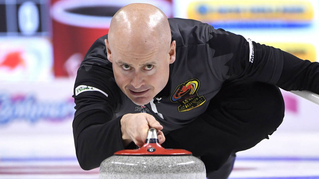 Team-Koe-skip-Kevin-Koe-throws-a-rock-during-a-draw-against-Team-Laycock-at-the-2017-Roar-of-the-Rings-Canadian-Olympic-Curling-Trials-in-Ottawa-on-Saturday,-Dec.-2,-2017.-(Justin-Tang/CP)