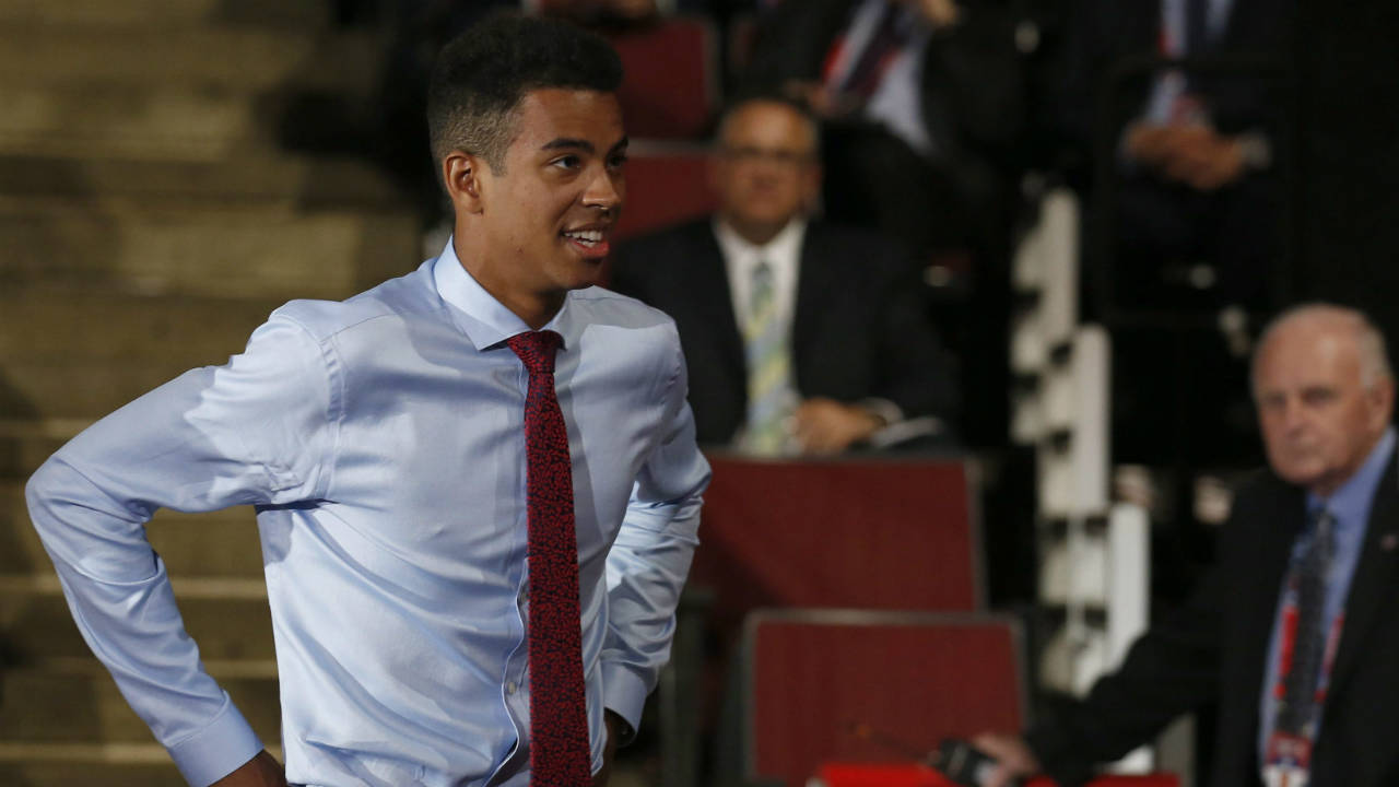 Pierre-Olivier-Joseph-walks-to-the-stage-after-being-selected-by-the-Arizona-Coyotes-during-the-first-round-of-the-NHL-hockey-draft,-Friday,-June-23,-2017,-in-Chicago.-(Nam-Y.-Huh/AP)