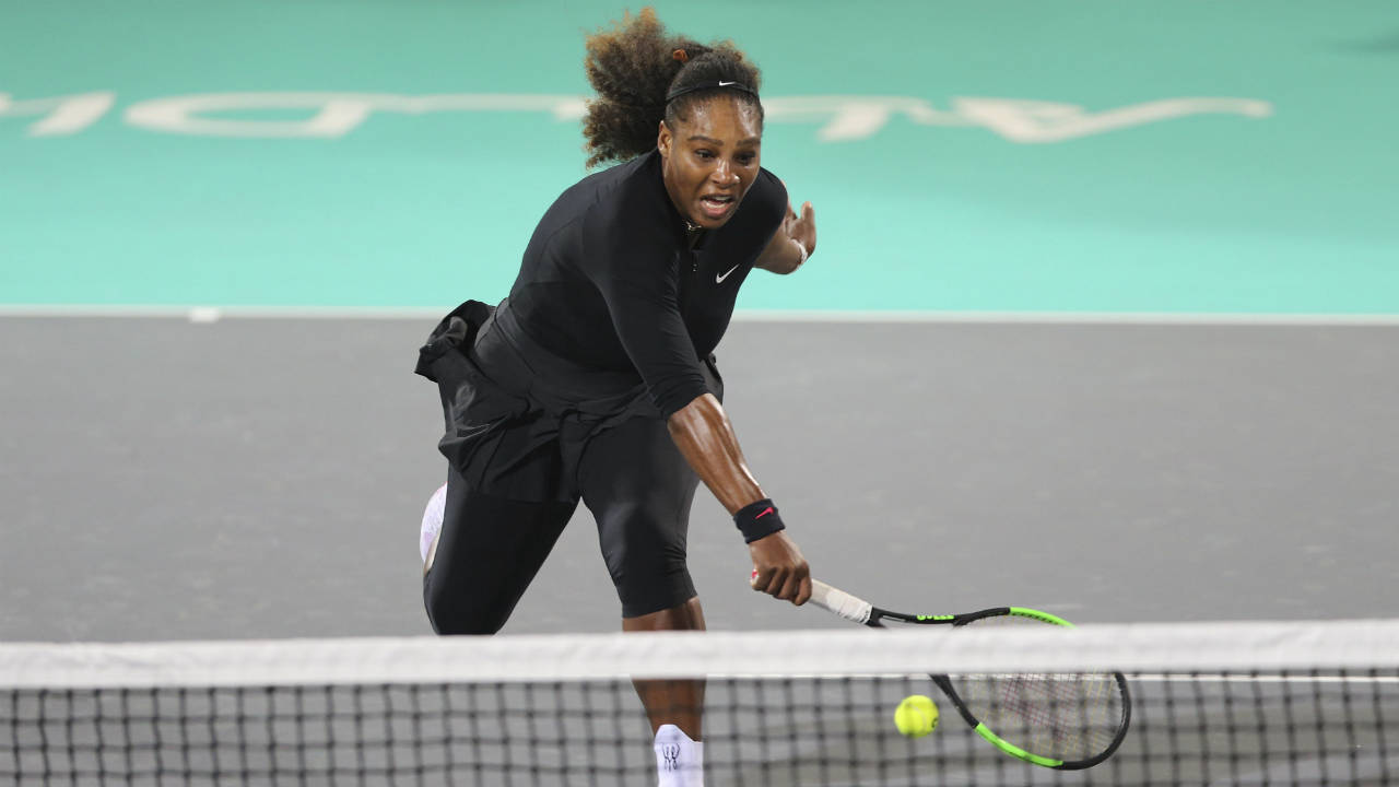 Serena-Williams-from-the-U.S.-returns-the-ball-to-Jelena-Ostapenko-of-Latvia-during-the-final-day-of-the-Mubadala-World-Tennis-Championship-in-Abu-Dhabi,-United-Arab-Emirates,-Saturday,-Dec.-30,-2017.-(Kamran-Jebreili/AP)