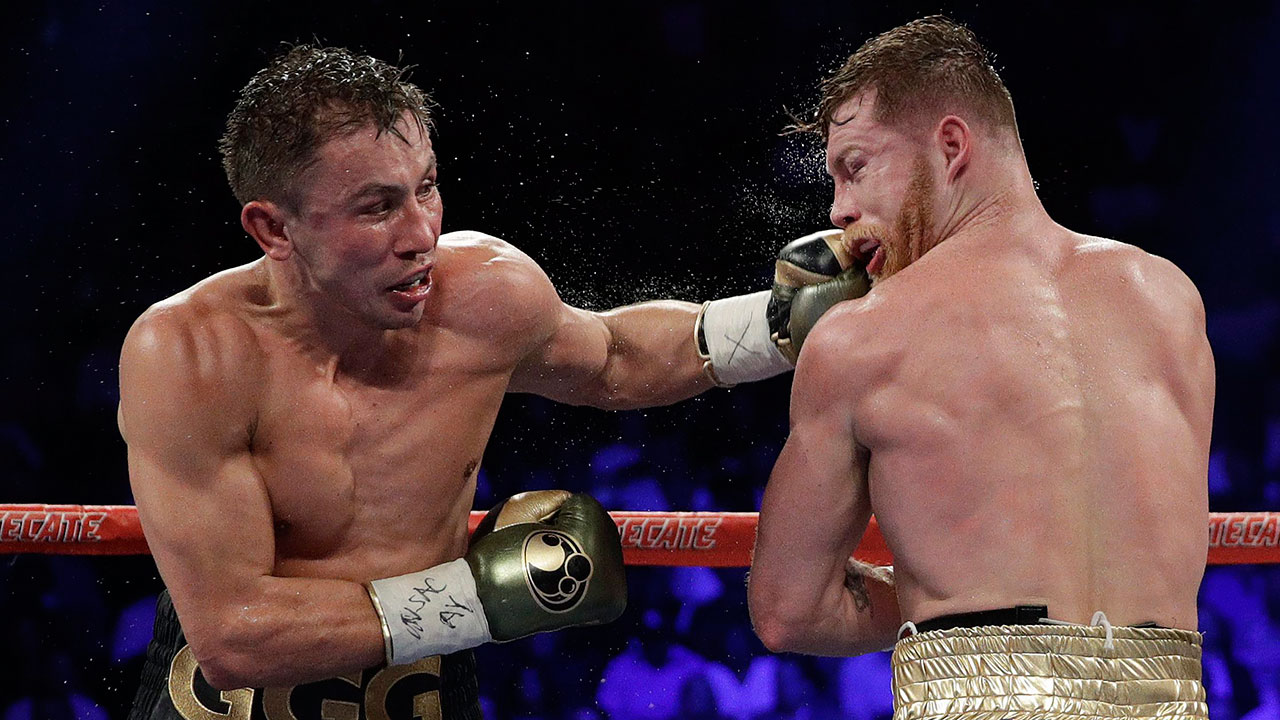 Gennady-Golovkin-punches-Canelo-Alvarez