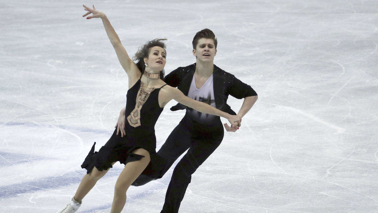 Carolane-Soucisse-and-Shane-Firus-of-Canada-perform-their-short-program-in-the-ice-dance-event-at-the-ISU-Four-Continents-Figure-Skating-Championships-in-Taipei,-Taiwan,-Wednesday,-Jan.-24,-2018.-(Chiang-Ying-ying/AP)