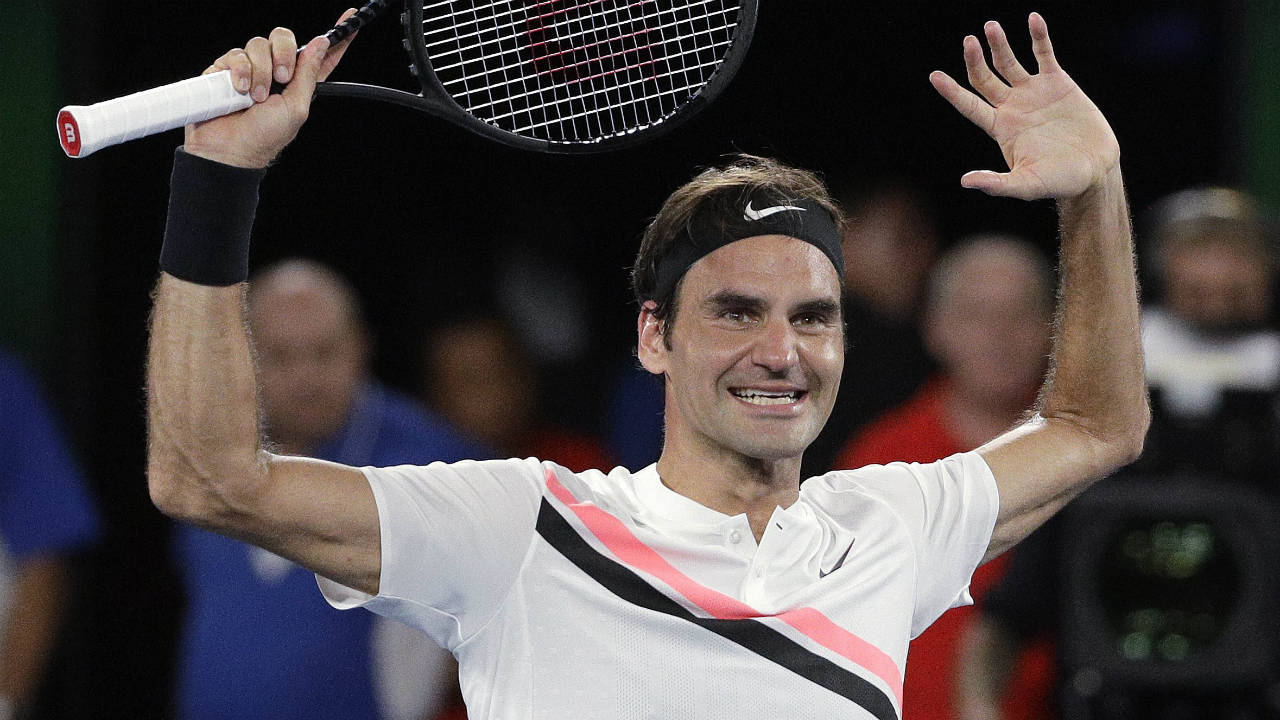 Switzerland's-Roger-Federer-raises-his-arms-after-defeating-Croatia's-Marin-Cilic-in-the-men's-singles-final-at-the-Australian-Open-tennis-championships-in-Melbourne,-Australia,-Sunday,-Jan.-28,-2018.-(Dita-Alangkara/AP)