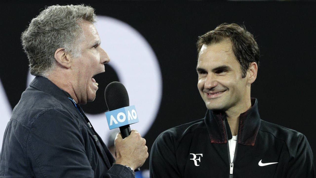 U.S.-actor-Will-Ferrell,-left,-interviews-Switzerland's-Roger-Federer-on-Rod-Laver-Arena-following-his-first-round-match-against-Slovenia's-Aljaz-Bedene-at-the-Australian-Open-tennis-championships-in-Melbourne,-Australia,-Tuesday,-Jan.-16,-2018.-(Dita-Alangkara/AP)