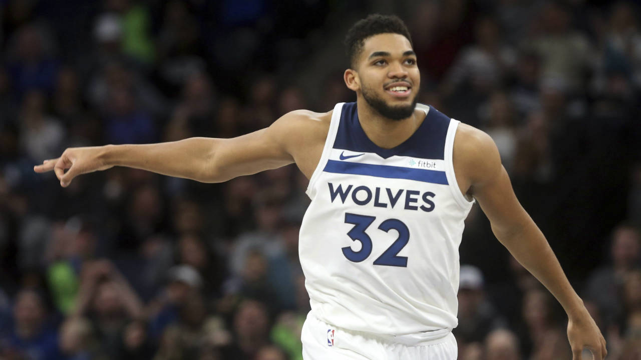 Minnesota-Timberwolves'-Karl-Anthony-Towns-celebrates-a-three-point-basket-in-the-second-half-of-an-NBA-basketball-game-against-the-New-York-Knicks,-Friday,-Jan.-12,-2018,-in-Minneapolis.-(Jim-Mone/AP)