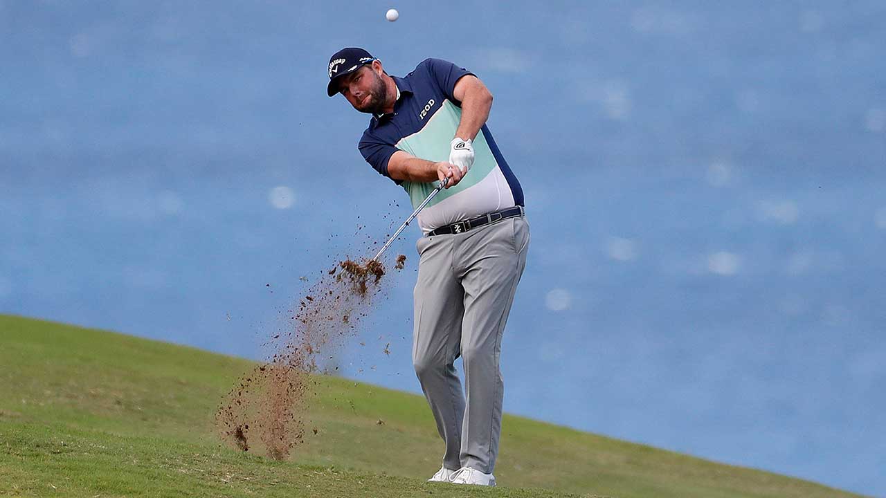 Brian Harman, Marc Leishman share lead at windy Kapalua