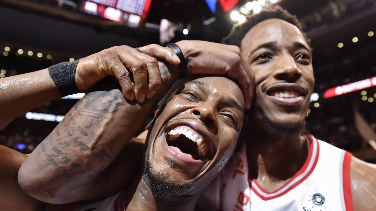 Toronto-Raptors'-Kyle-Lowry,-left,-and-DeMar-DeRozan-celebrate-after-defeating-the-Milwaukee-Bucks-in-NBA-basketball-action-in-Toronto-on-Monday,-January-1,-2018.-(Frank-Gunn/CP)