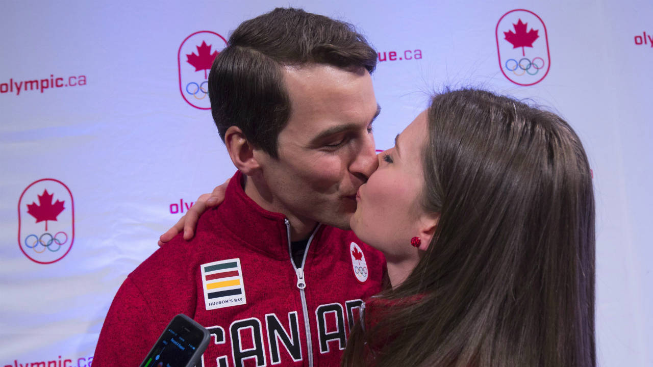 Denny-Morrison-kisses-his-wife-Josie-after-the-announcement-that-they-both-made-the-Canadian-Olympic-speedskating-team-in-Calgary,-Wednesday,-Jan.-10,-2018.-(Todd-Korol/CP)