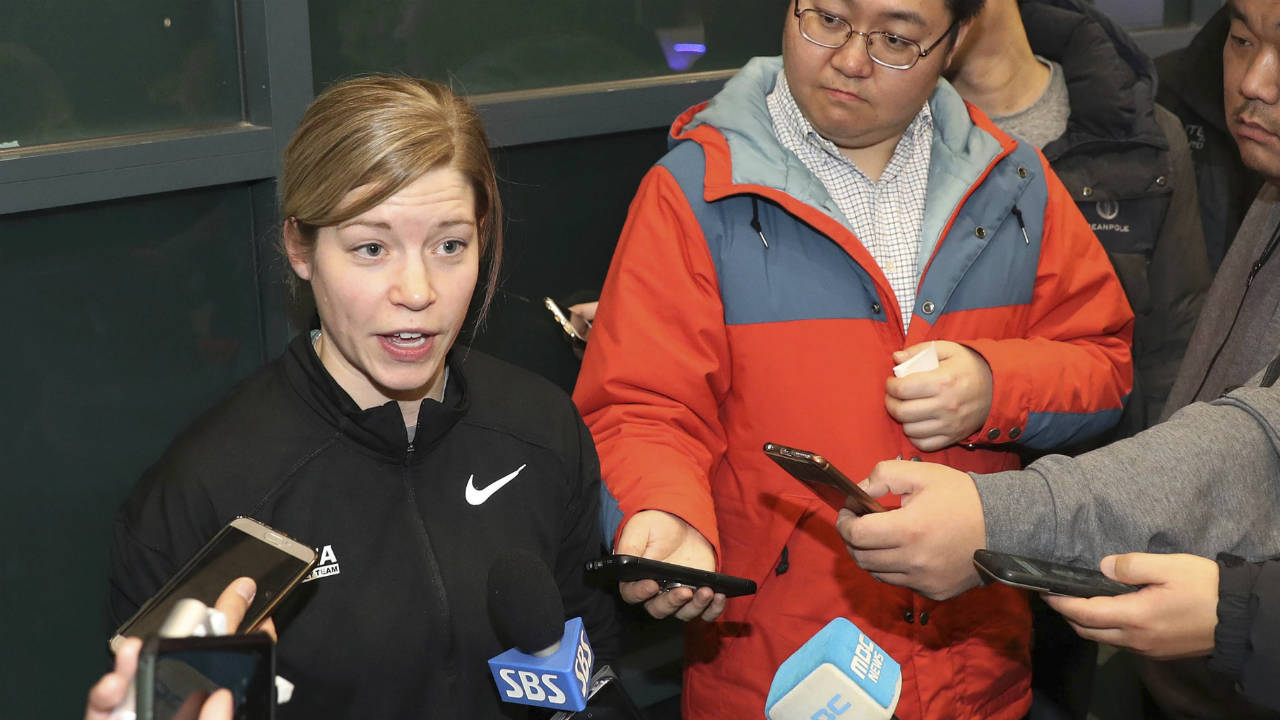 In-this-Tuesday,-Jan.-16,-2018,-photo,-South-Korean-women's-hockey-team-head-coach-Sarah-Murray-speaks-as-she-returns-from-the-team's-U.S.-training-camp,-at-Incehon-International-Airport-in-Incheon,-South-Korea.-There-is-growing-concern-in-South-Korea-that-a-proposal-to-form-a-joint-women's-hockey-team-with-North-Korea-for-the-Olympics-could-be-bad-for-the-South-Korean-players.-"Adding-somebody-so-close-to-the-Olympics-is-a-little-bit-dangerous-just-for-team-chemistry-because-the-girls-have-been-together-for-so-long,"-she-said.-(Ha-Sa-hun/Yonhap-via-AP)