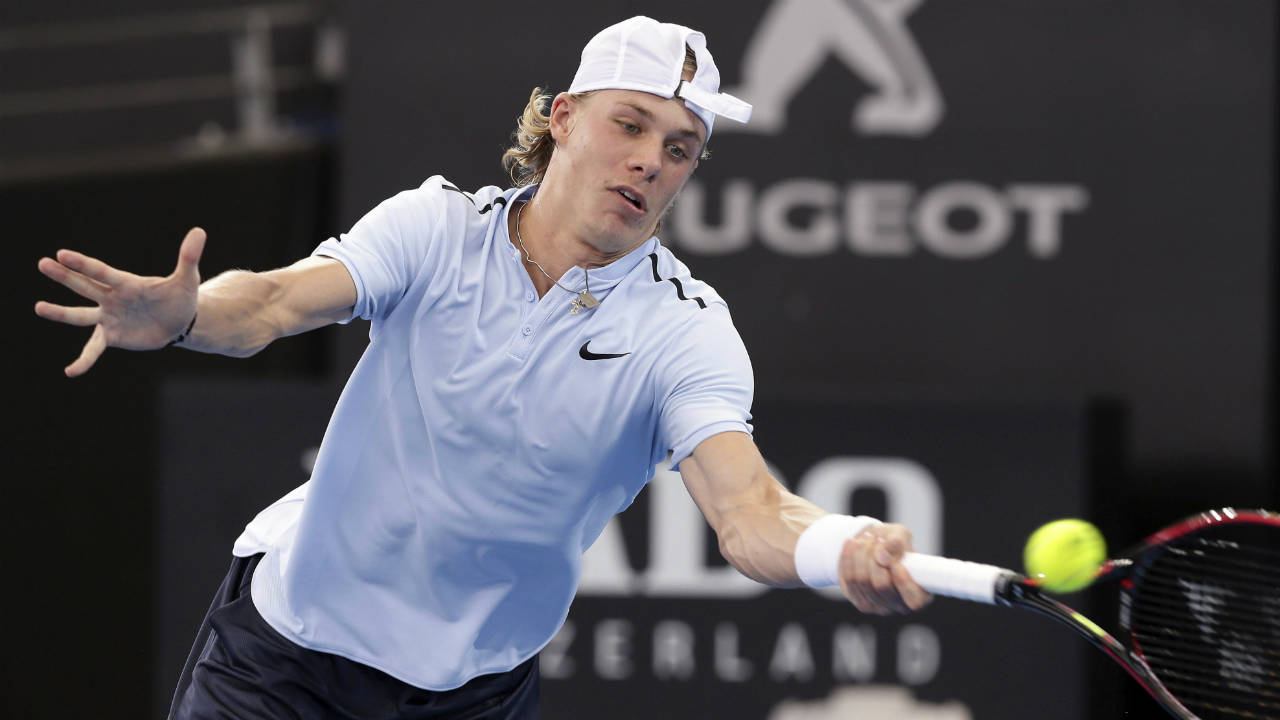 Denis-Shapovalov-of-Canada-plays-a-shot-in-his-match-against-Kyle-Edmund-of-Britain-during-the-Brisbane-International-tennis-tournament-in-Brisbane,-Australia,-Tuesday,-Jan.-2,-2018.-(Tertius-Pickard/AP)