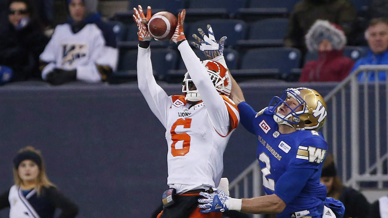 BC-Lions'-T.J.-Lee-(6)-hauls-in-the-pass-intended-for-Winnipeg-Blue-Bombers'-Matt-Coates-(2)-during-the-second-half-of-CFL-action-in-Winnipeg-Saturday,-October-28,-2017.-(John-Woods/CP)