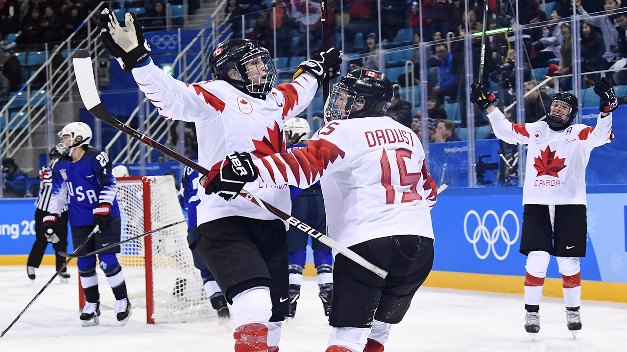 Canada forward Marie-Philip Poulin (29) celebrates her goal against the United States with teammate Melodie Daoust (15) during second period women's gold medal final Olympic hockey action at the 2018 Olympic Winter Games in Gangneung, South Korea on Thursday, Feb. 22, 2018. (Nathan Denette/CP)