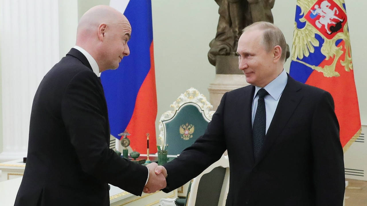 Russian-President-Vladimir-Putin,-right,-greets-FIFA-president-Gianni-Infantino-during-their-meeting-in-the-Kremlin-in-Moscow,-Russia,-Monday,-Feb.-12,-2018.-(Mikhail-Klimentyev/AP)