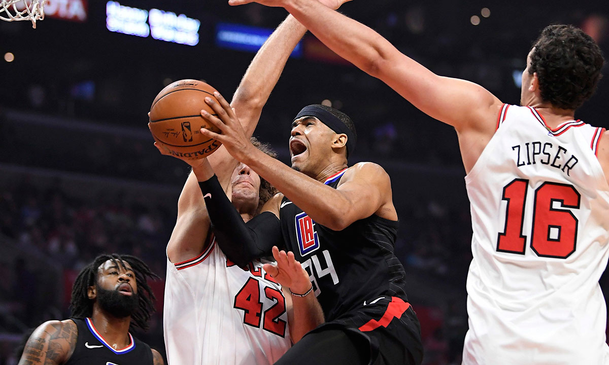 Tobias Harris and Boban Marjanovic of the LA Clippers exchange