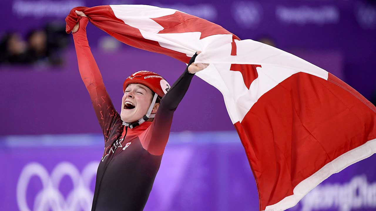 Canada's-Kim-Boutin,-of-Sherbrooke,-Que.,-celebrates-after-winning-bronze-in-the-women's-1500-metre-short-track-speedskating