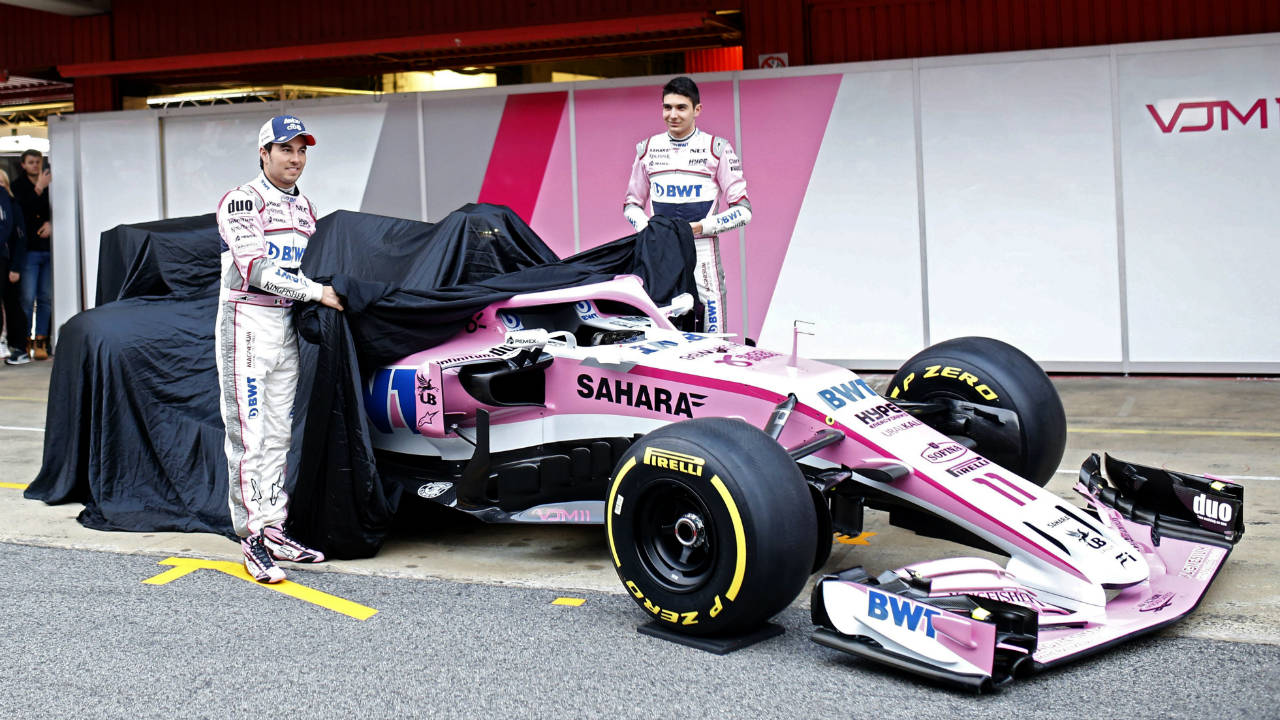 Force-India-drivers-Sergio-Perez-of-Mexico,-left,-and-Esteban-Ocon-of-France-unveil-the-new-team's-car-during-the-Force-India-team-official-presentation-at-the-Catalunya-racetrack-in-Montmelo,-outside-Barcelona,-Spain,-Monday,-Feb.-26,-2018.-(Francisco-Seco/AP)