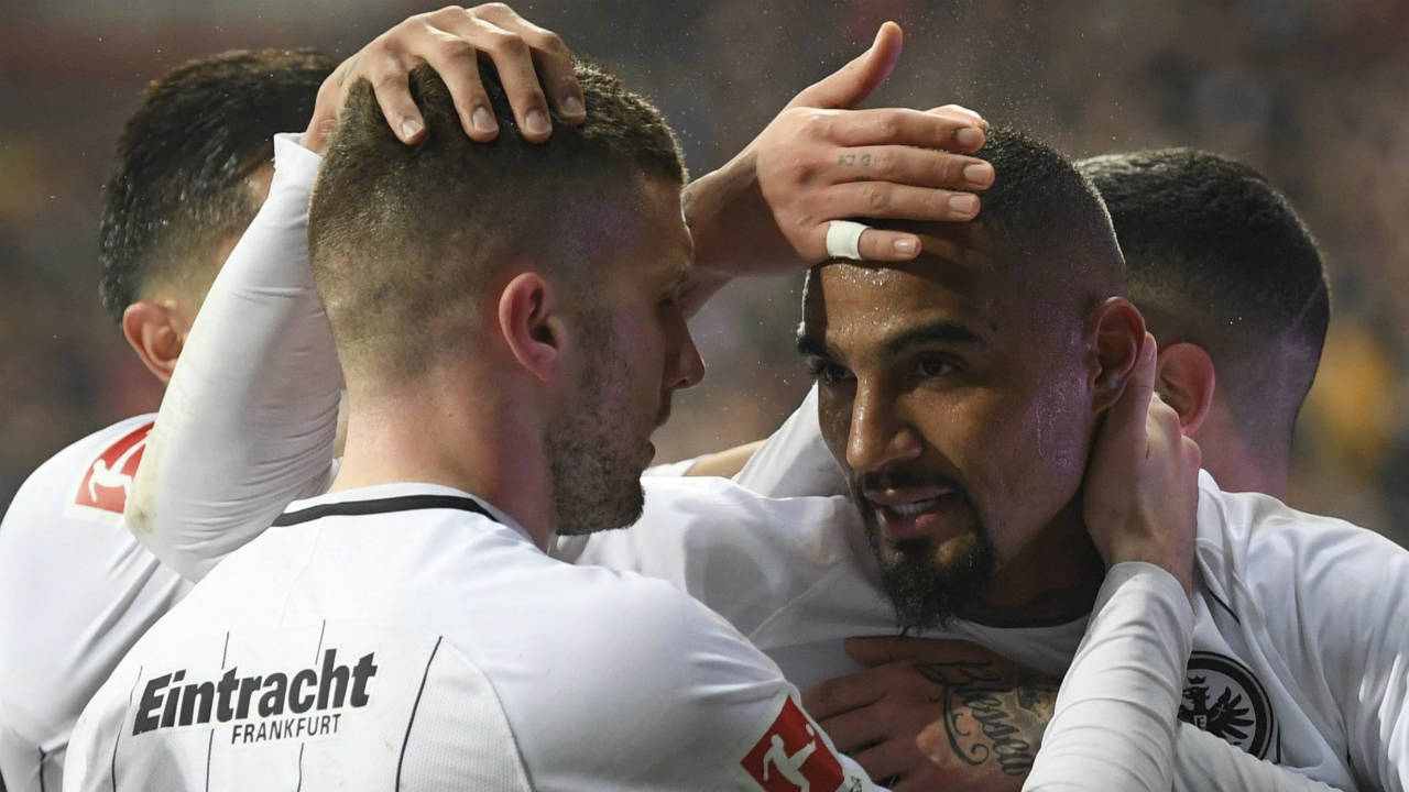 Frankfurt's-Kevin-Prince-Boateng,-right,-celebrates-a-goal.-(Arne-Dedert/dpa-via-AP)
