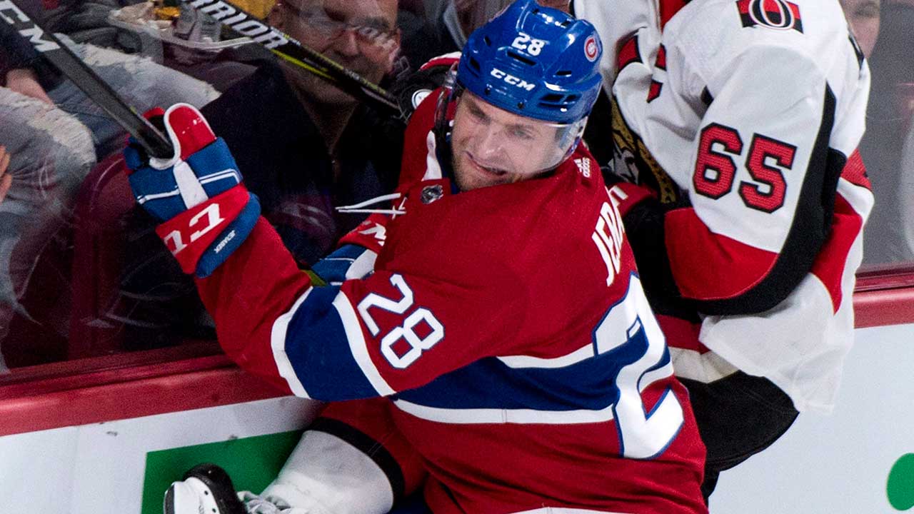 Ottawa-Senators'-Erik-Karlsson-is-checked-into-the-boards-by-Montreal-Canadiens'-JakubJerabek-during-second-period-NHL-hockey-action-Wednesday,-November-29,-2017-in-Montreal.-(Paul-Chiasson/CP)