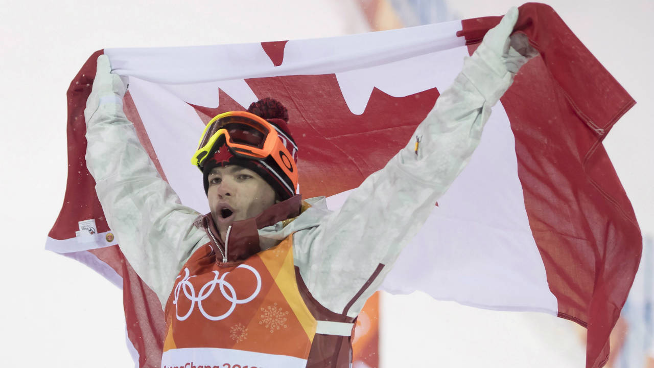 Canadian-Mikael-Kingsbury-celebrates-winning-his-gold-medal-at-the-moguls-finals-at-the-Phoenix-Snow-Park-at-the-Pyeongchang-2018-Winter-Olympic-Games-in-South-Korea,-Monday,-Feb.-12,-2018.-(Jonathan-Hayward/CP)