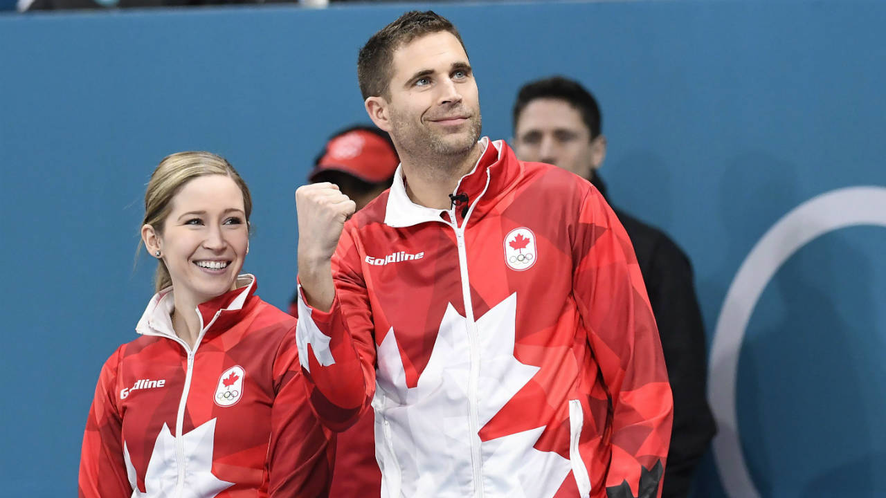 Canada's-Kaitlyn-Lawes-and-teammate-John-Morris-looks-towards-the-stands-before-the-mixed-doubles-gold-medal-curling-action-against-Switzerland-at-the-Olympic-Winter-Games-in-Gangneung,-South-Korea-on-Tuesday,-February-13,-2018.-(Nathan-Denette/CP)