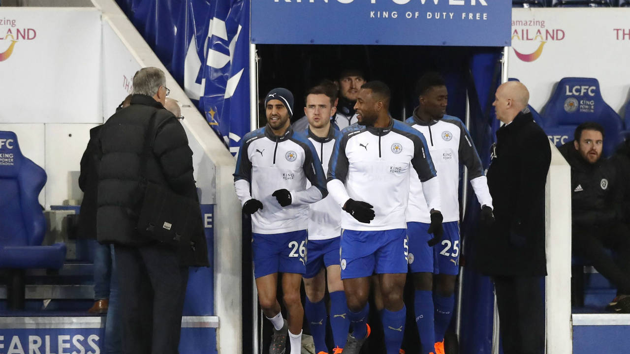 Leicester-City's-Riyad-Mahrez,-left,-warms-up-with-teammates-prior-to-the-Emirates-FA-Cup.-(Martin-Rickett/PA-via-AP)