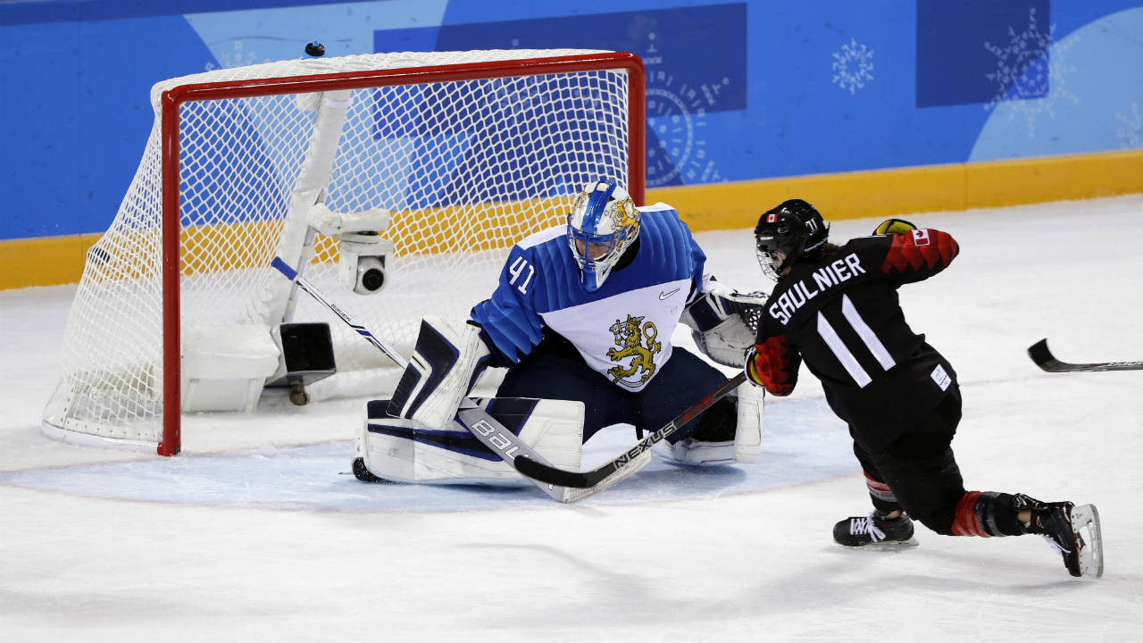 Jillian-Saulnier-(11),-of-Canada,-scores-a-goal-against-goalie-Noora-Raty-(41),-of-Finland,-during-the-second-period-of-the-preliminary-round-of-the-women's-hockey-game-at-the-2018-Winter-Olympics-in-Gangneung,-South-Korea,-Tuesday,-Feb.-13,-2018.-(Frank-Franklin-II/AP)