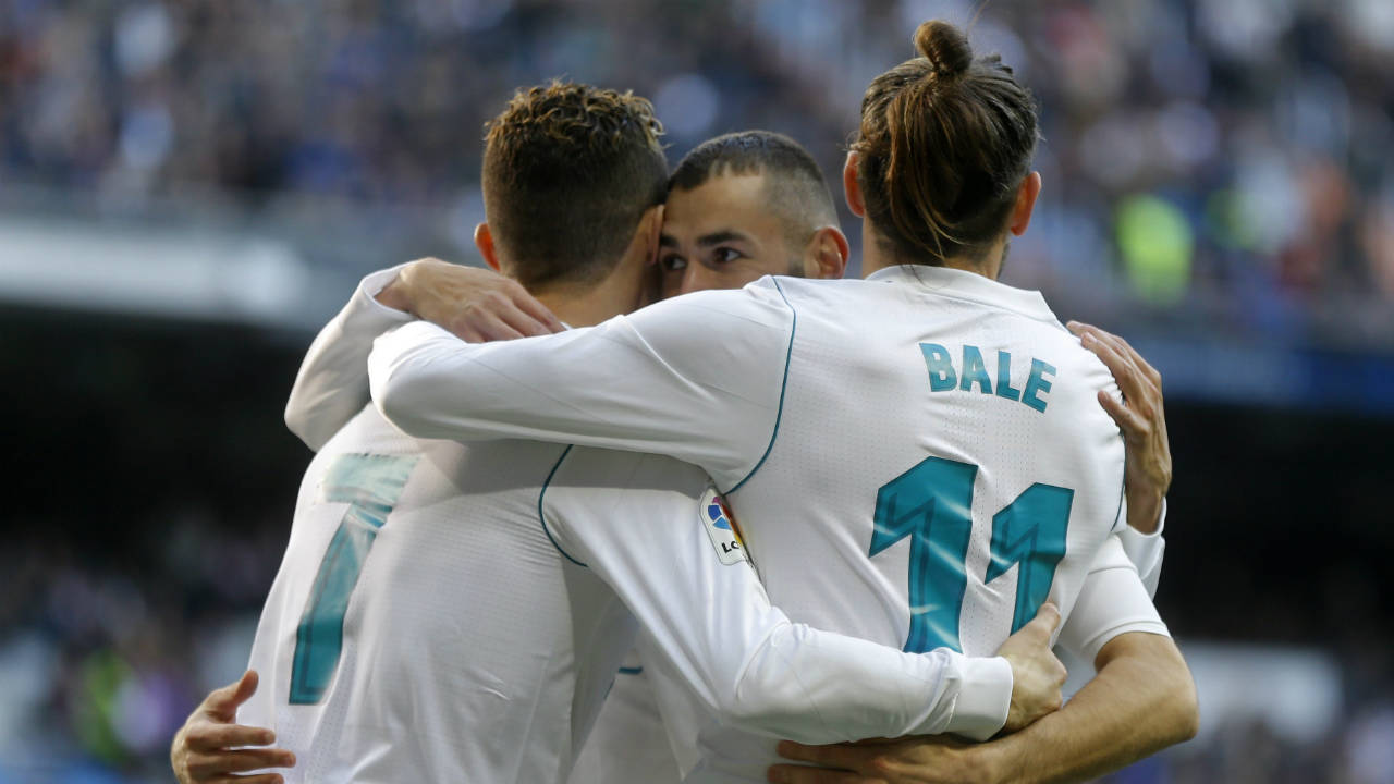 Real-Madrid's-Cristiano-Ronaldo,-left,-Karim-Benzema,-centre,-and-Gareth-Bale-celebrate-a-goal-against-Alaves-during-the-Spanish-La-Liga-soccer-match-between-Real-Madrid-and-Alaves-at-the-Santiago-Bernabeu-stadium-in-Madrid,-Saturday,-Feb.-24,-2018.-Ronaldo-scored-twice-and-Benzema-and-Bale-once-each-in-Real-Madrid's-4-0-victory.-(Francisco-Seco/AP)
