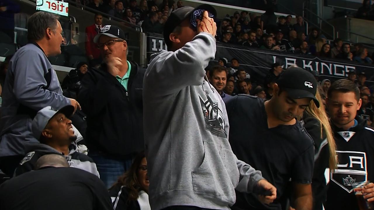 Kings fan takes puck to face, returns to watch game: Hot Clicks - Sports  Illustrated