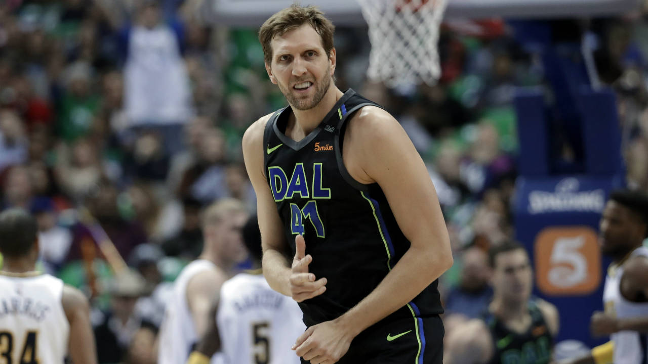 Dallas-Mavericks-centre-Dirk-Nowitzki-celebrates-sinking-a-3-point-basket-during-the-first-half-of-the-team's-NBA-basketball-game-against-the-Denver-Nuggets-in-Dallas,-Tuesday,-March-6,-2018.-(Tony-Gutierrez/AP)