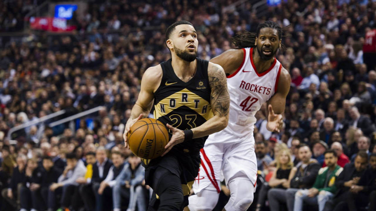 Toronto-Raptors-guard-Fred-VanVleet-(23)-drives-to-the-net-past-Houston-Rockets-centre-Nene-Hilario-(42)-during-first-half-NBA-basketball-action-in-Toronto-on-Friday,-March-9,-2018.-(Christopher-Katsarov/CP)