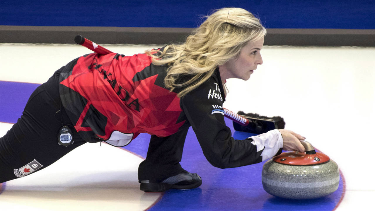 Canada-skip-Jennifer-Jones-delivers-a-shot-as-they-face-Denmark-at-the-World-Women's-Curling-Championship-Tuesday,-March-20,-2018-in-North-Bay,-Ontario.-(Paul-Chiasson/CP)