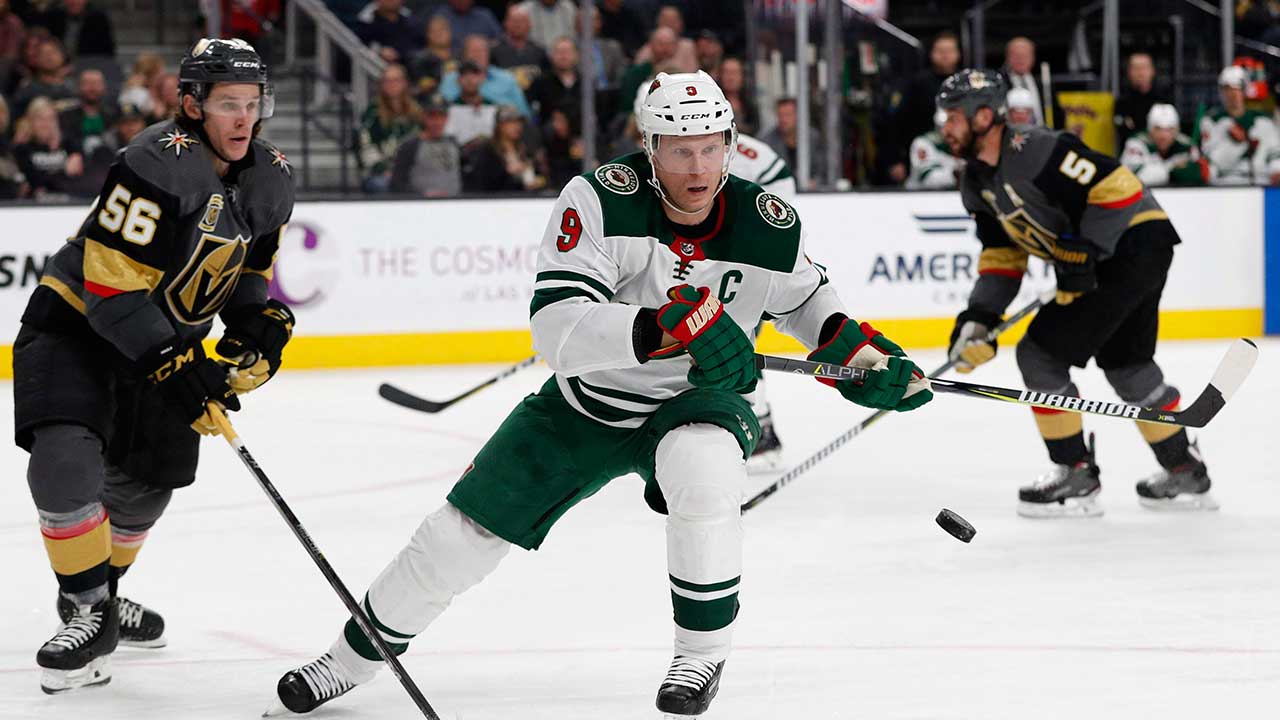 Minnesota Wild centre Mikko Koivu (9) vies for the puck. (John Locher/AP)