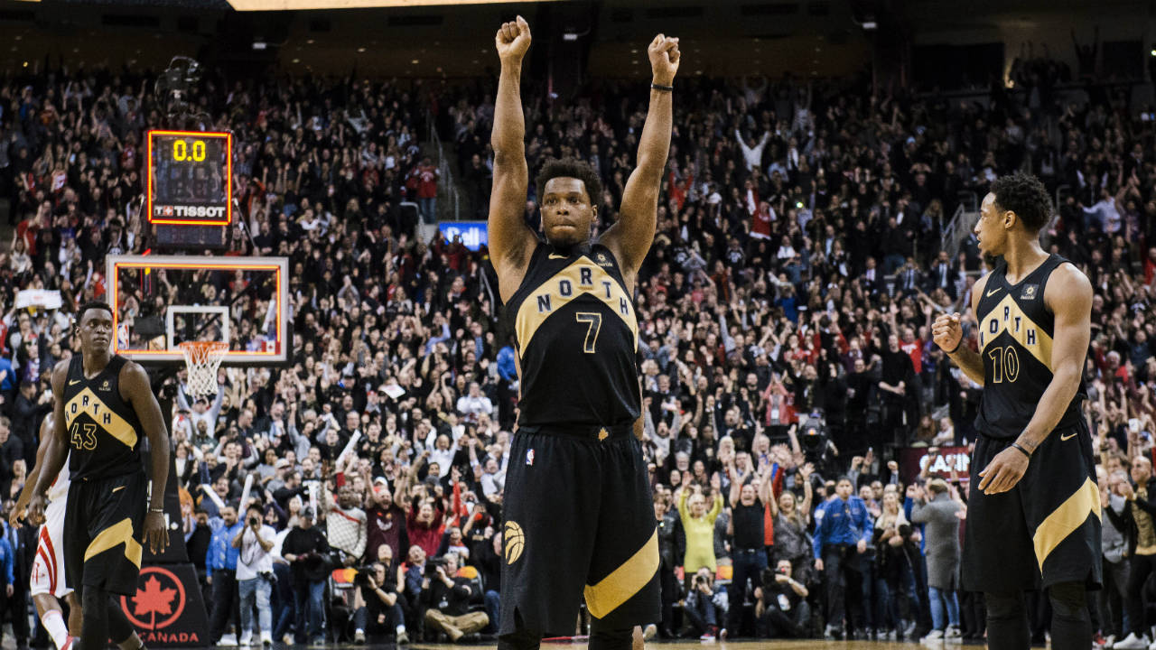 Toronto-Raptors-guard-Kyle-Lowry-(7)-reacts-after-defeating-the-Houston-Rockets-in-NBA-basketball-action-in-Toronto-on-Friday,-March-9,-2018.-(Christopher-Katsarov/CP)
