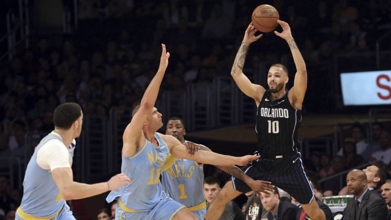 Orlando-Magic's-Evan-Fournier-(10)-passes-the-ball-over-Los-Angeles-Lakers,-including-centre-Brook-Lopez-(11),-during-the-first-half-of-an-NBA-basketball-game-in-Los-Angeles-on-Wednesday,-March-7,-2018.-(Reed-Saxon/AP)