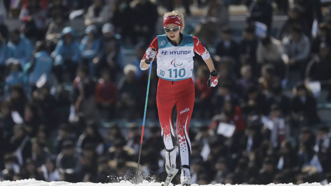 Bronze-medalist-Natalie-Wilkie-of-Canada-competes-in-the-qualification-of-the-women's-1.5km-sprint-classic,-standing,-cross-country-skiing-at-the-2018-Winter-Paralympics-in-Pyeongchang,-South-Korea,-Wednesday,-March-14,-2018.-(Lee-Jin-man/AP)