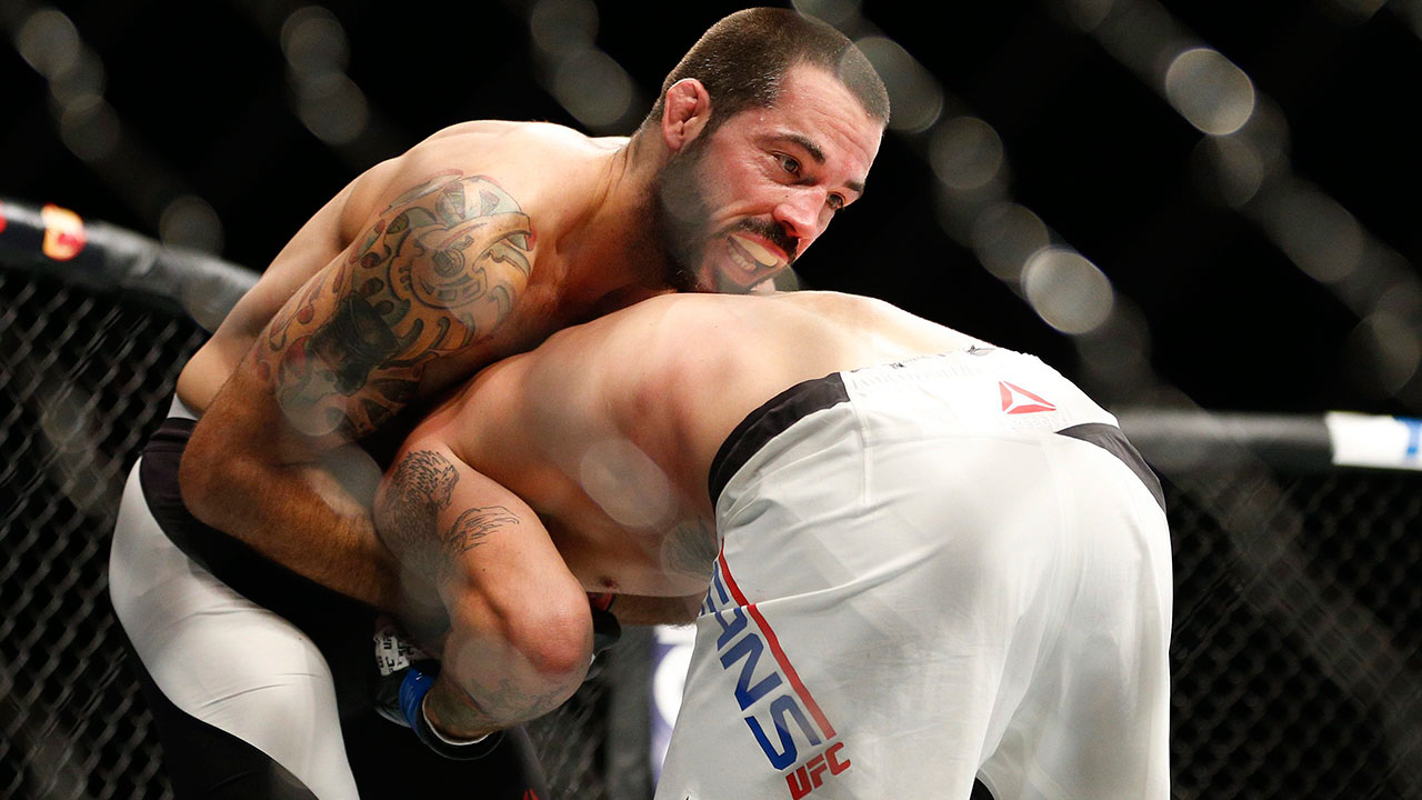 Matt-Brown-seen-here-wrestling-with-Tim-Means-during-their-welterweight-mixed-martial-arts-bout-at-UFC-189.