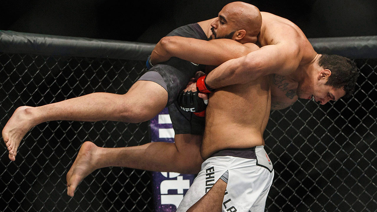 Luis-Henrique-is-lifted-by-Arjan-Bhullar-during-their-mixed-martial-arts-bout-at-UFC-215-in-Edmonton.