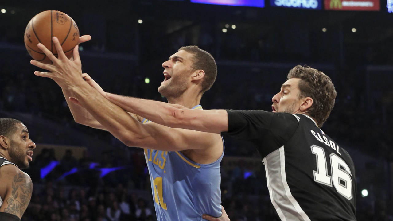 Los-Angeles-Lakers-centre-Brook-Lopez-(11)-is-fouled-by-San-Antonio-Spurs'-Pau-Gasol-(16)-during-the-first-half-of-an-NBA-basketball-game-in-Los-Angeles-on-Wednesday,-April-4,-2018.-(Reed-Saxon/AP)