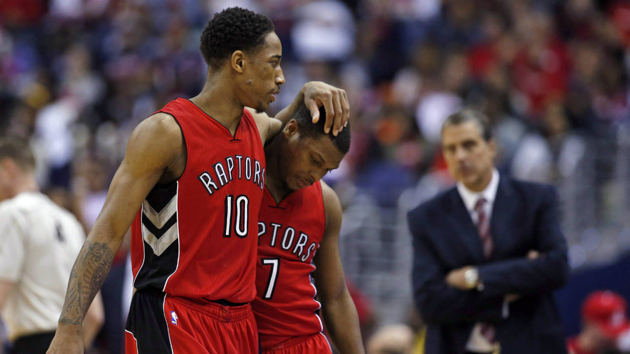 Toronto-Raptors-guards-DeMar-DeRozan-(10)-and-Kyle-Lowry-(7)-walk-to-the-bench-in-the-second-half-of-Game-4-in-the-first-round-of-the-NBA-basketball-playoffs-against-the-Washington-Wizards,-Sunday,-April-26,-2015,-in-Washington.-(Alex-Brandon/AP)