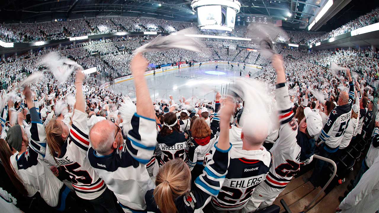 Winnipeg-Jets'-fans-cheer-on-the-team-as-they-hit-the-ice-prior-to-Game-1