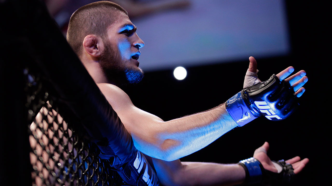 Khabib-Nurmagomedov-leans-on-the-cage-following-a-win-over-Thiago-Tavares