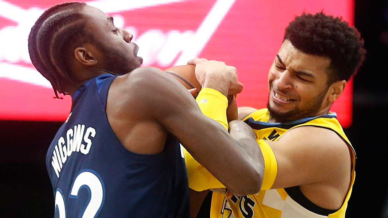 Minnesota-Timberwolves'-Andrew-Wiggins,-left,-and-Denver-Nuggets'-Jamal-Murray