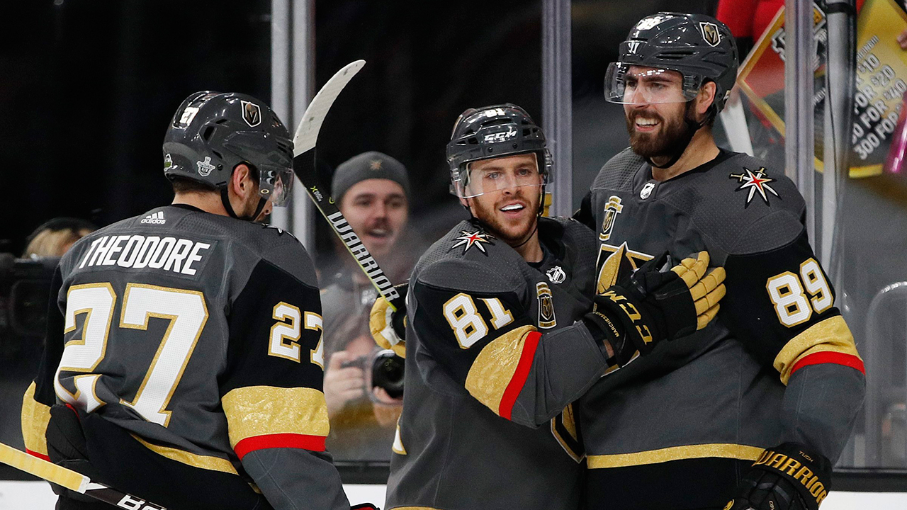 Vegas-Golden-Knights-center-Jonathan-Marchessault-congratulates-right-wing-Alex-Tuch,-who-scored-against-the-San-Jose-Sharks