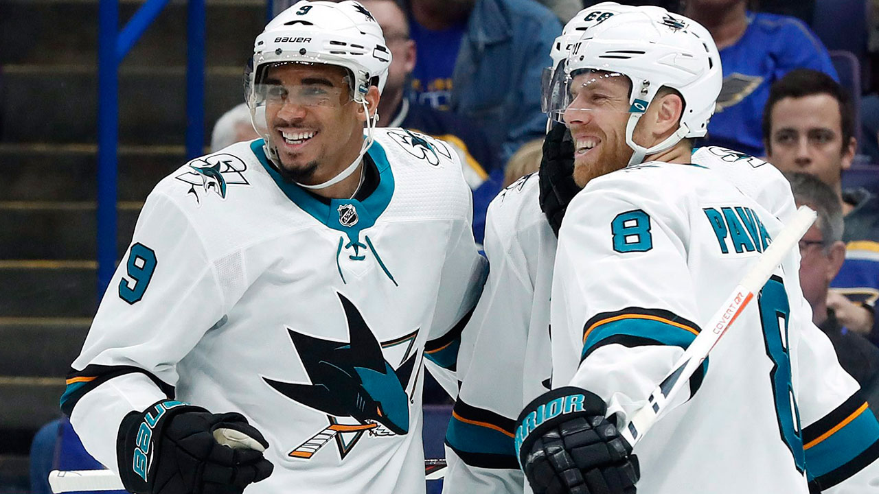 San-Jose-Sharks'-Evander-Kane-is-congratulated-by-Joe-Pavelski-after-scoring-a-goal-against-the-St.-Louis-Blues.