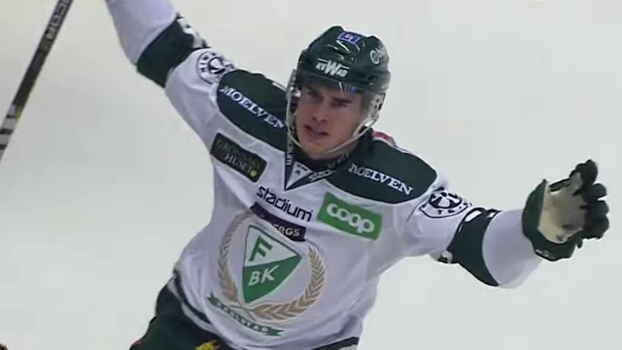 Michael-Lindqvist-celebrates-a-goal-he-scored-as-a-member-of-Färjestad-in-the-Swedish-Hockey-League.