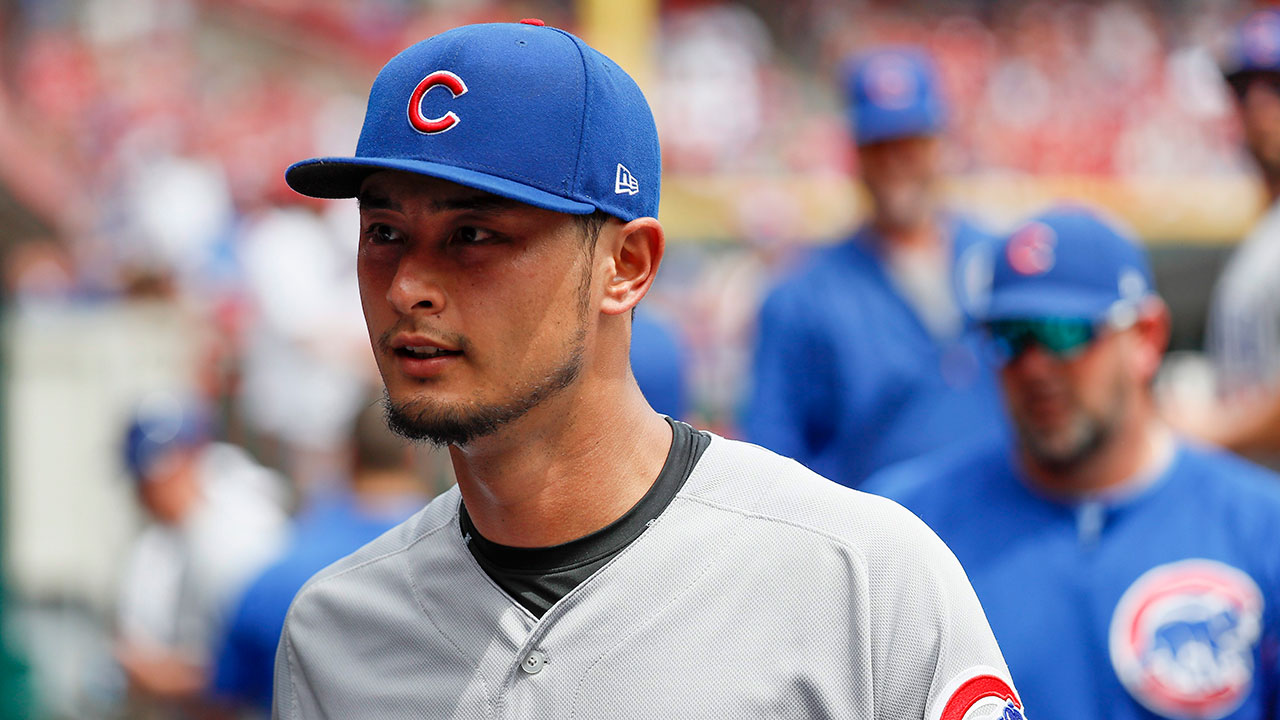 In this Sunday, May 20, 2018, file photo, Chicago Cubs starting pitcher Yu Darvish walks through the dugout after closing the sixth inning of a baseball game against the Cincinnati Reds in Cincinnati. The Cubs placed= Darvish on the 10-day disabled list on Saturday, May 26, 2018, retroactive to May 23, with right triceps tendonitis. (John Minchillo/AP)
