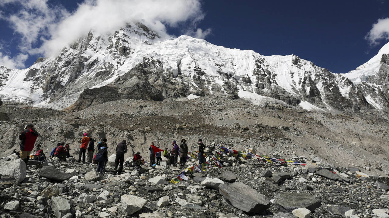In-this-Sept.-27,-2015-file-photo,-trekkers-rest-at-Everest-Base-Camp,-Nepal.-(Tashi-Sherpa,-File/AP)