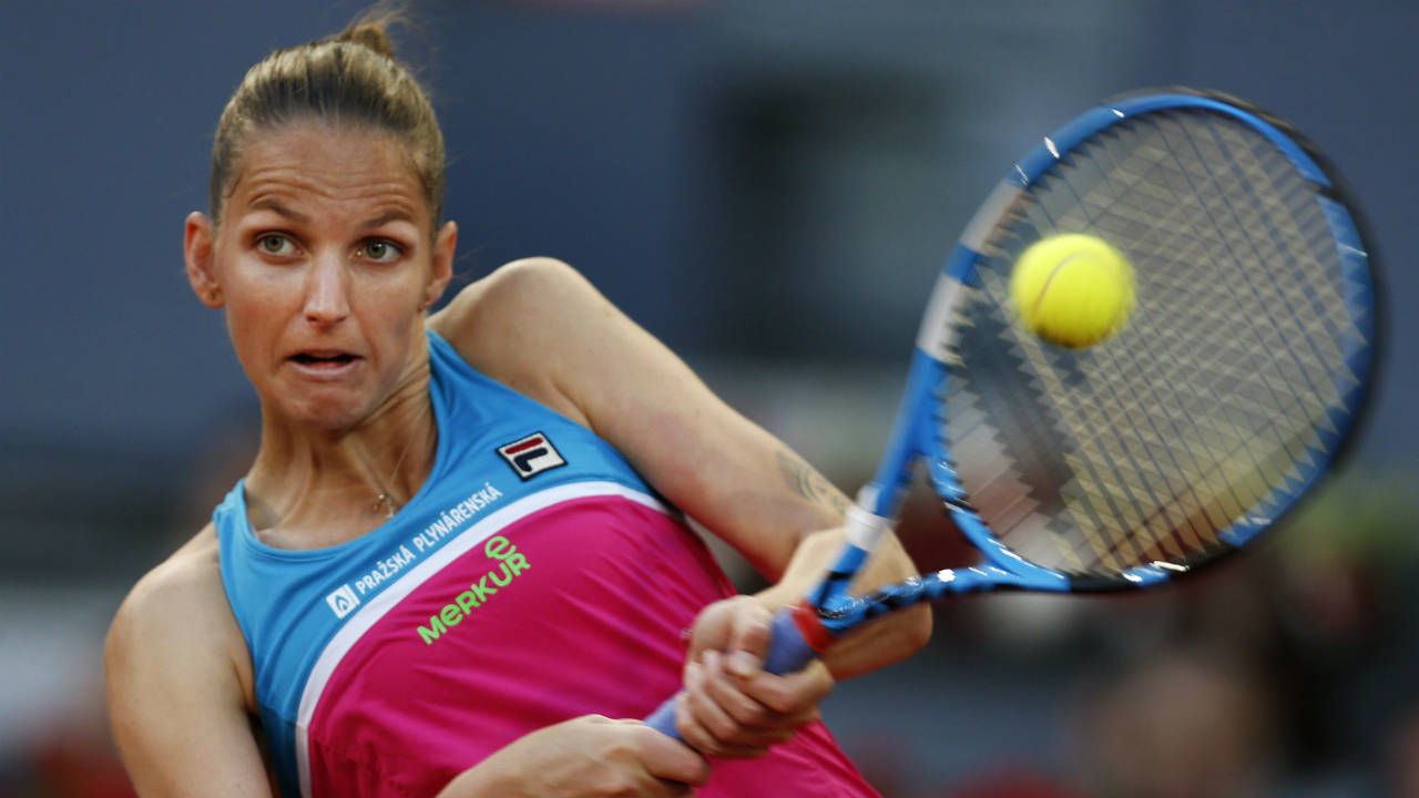 Karolina-Pliskova-from-Czech-Republic-returns-a-ball-from-Czech-Republic's-Petra-Kvitova-during-a-Madrid-Open-tennis-tournament-semifinal-match-in-Madrid,-Spain,-Friday,-May-11,-2018.-(Francisco-Seco/AP)