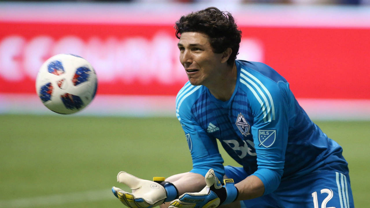 Vancouver-Whitecaps-goalkeeper-Brian-Rowe-makes-a-save-against-the-Houston-Dynamo-during-first-half-MLS-soccer-action-in-Vancouver-on-Friday-May-11,-2018.-Goalkeeper-Rowe-is-looking-to-get-his-second-start-when-the-Whitecaps-face-the-San-Jose-Earthquakes.